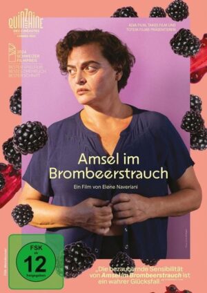 Amsel im Brombeerstrauch